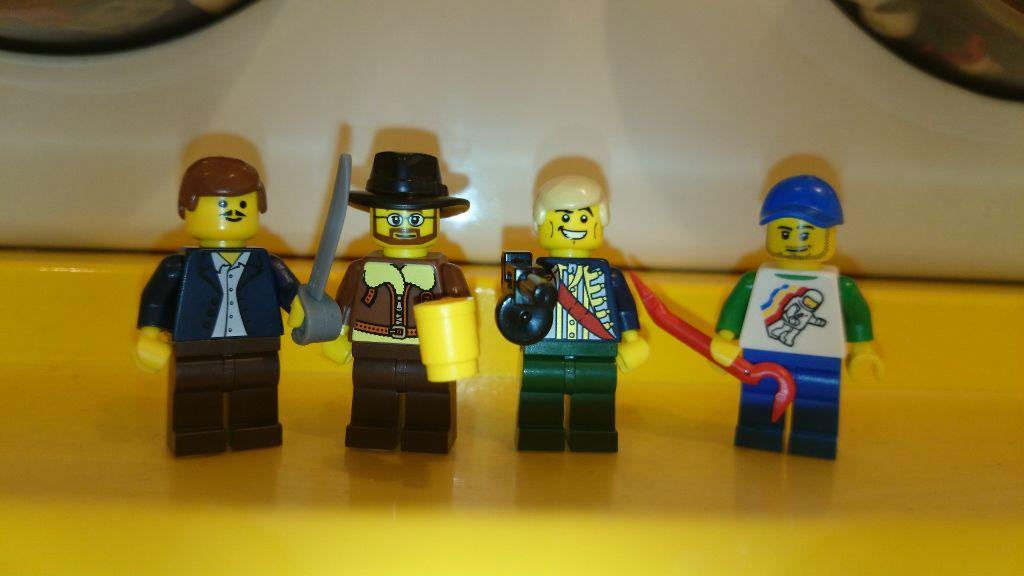 Lego figures on a lab desk